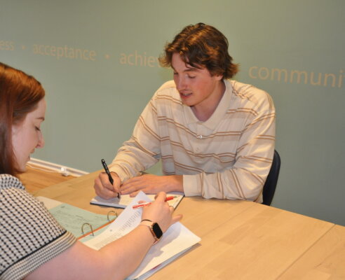 Student working with a tutor