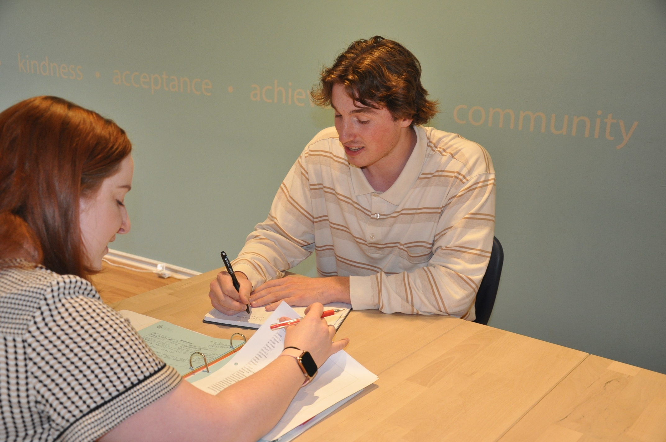 Student working with a tutor