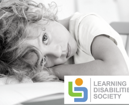 Young student sitting at a desk with their head resting on there hands LDS graphic