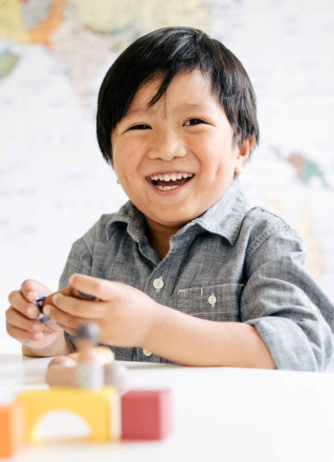 https://lightwelllearning.ca/wp-content/uploads/2022/12/Boy-playing-with-blocks.png