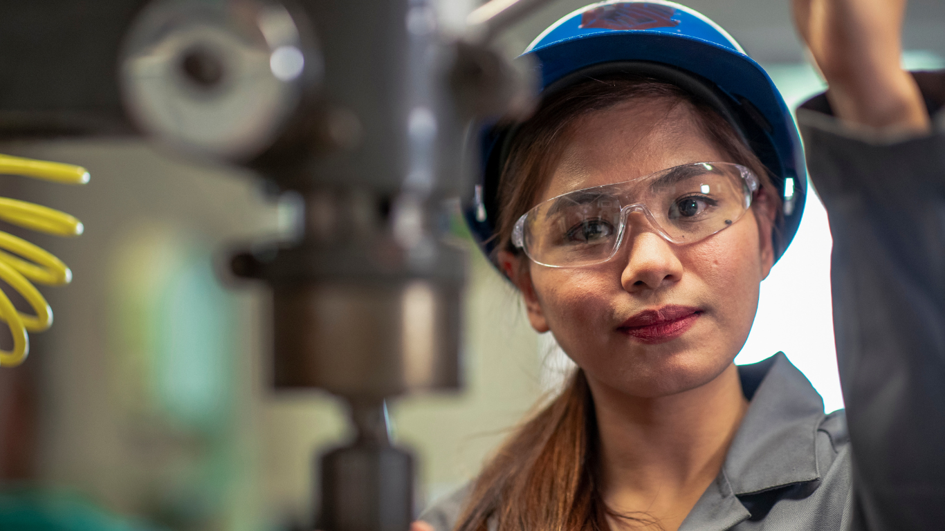 https://lightwelllearning.ca/wp-content/uploads/2022/12/young-woman-working-a-machine.png