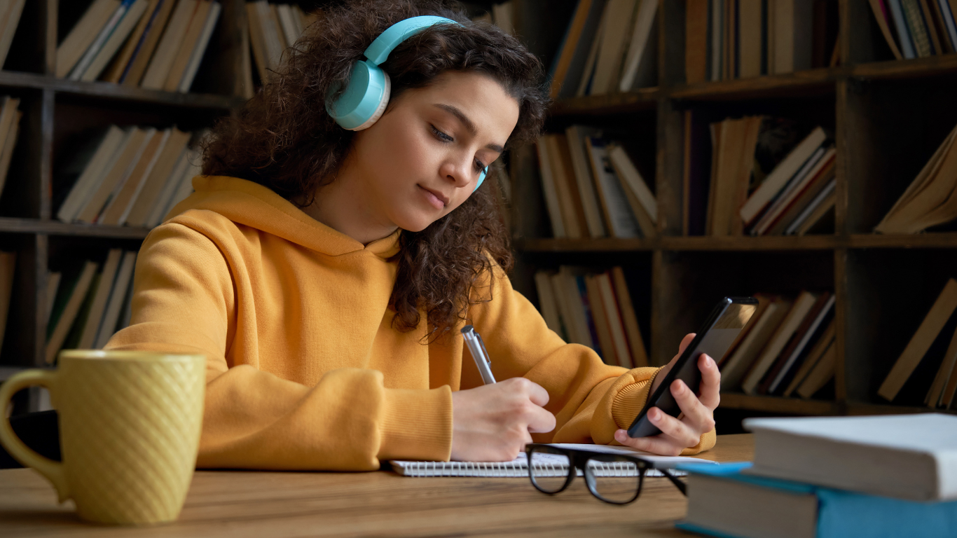 https://lightwelllearning.ca/wp-content/uploads/2023/03/headphones-coffee-and-study.png