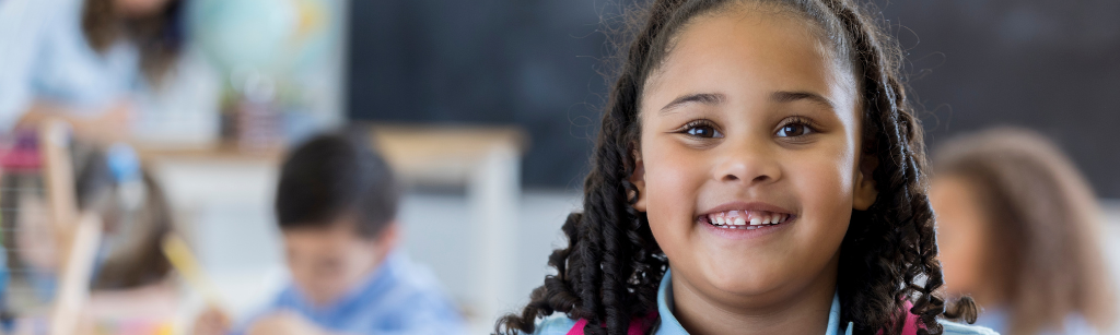 Child smiling and confident