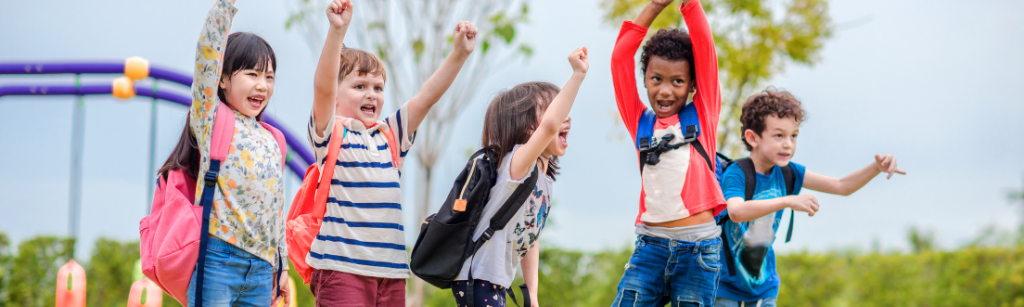 Kids raising their hands in a fun game