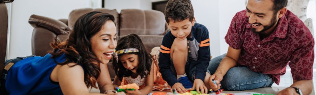 family playing together on floor