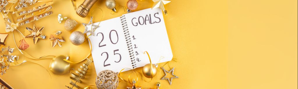 notebook for goals on yellow background