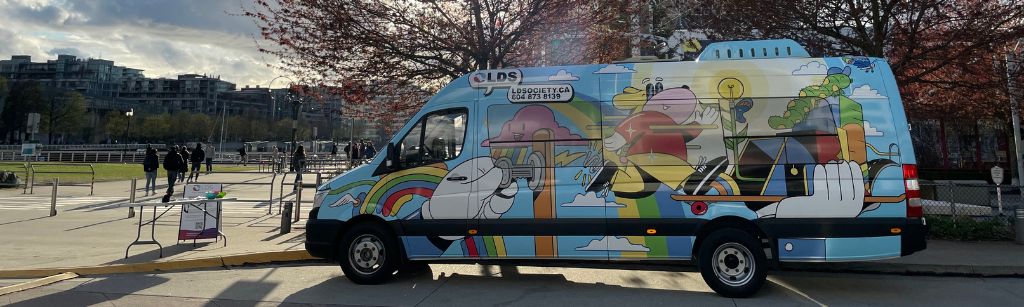 colourful mobile classroom parked on street